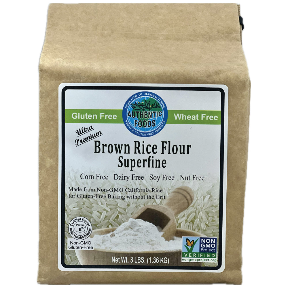 A 3 lb bag of Authentic Foods Brown Rice Flour Superfine, packaged in a brown kraft paper bag with a white and green front label.