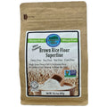 A 1.25 lb bag of Authentic Foods Brown Rice Flour Superfine, in a brown kraft paper bag with a large white and green label, on a white background.