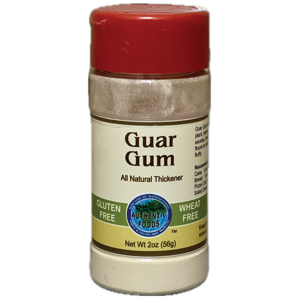 A 2 oz plastic bottle of Authentic Foods Guar Gum, an all natural thickener. The bottle has a red cap, a beige label with green and blue accents, and contains a light brown powder.
