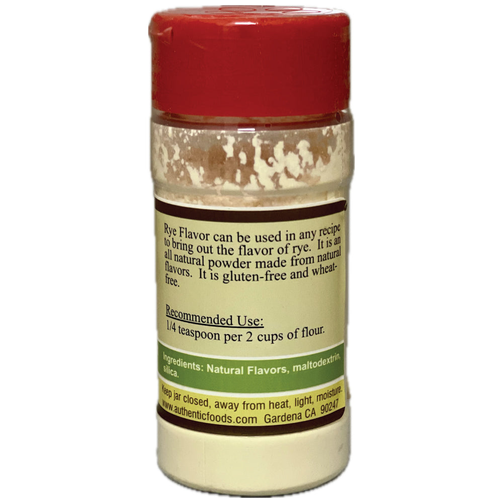 A clear plastic spice jar filled with a light beige powder, featuring a textured red lid and a white label with brown and green text detailing its use for rye flavoring.